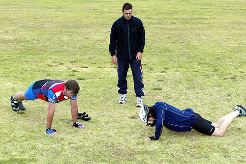 Carey keeping count on David and Hilary's push-up routine