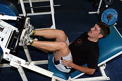 Andrew on the incline bench at a weights training session