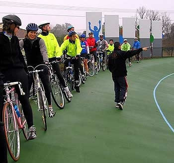 Carey handing out instructions a group training session 