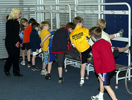 More stretches before the indoor wind training session begins