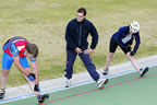 Carey supervising hamstring stretching with David & Hilary (60kb)